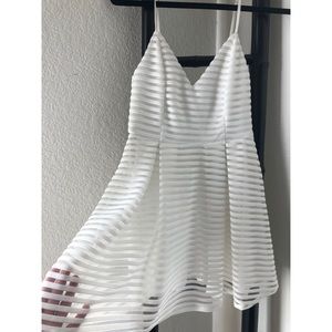 Boutique white striped sheer overlay mini dress